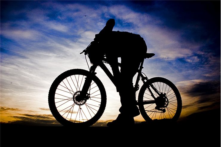 Picture Of Mountain And Bicycle Rider